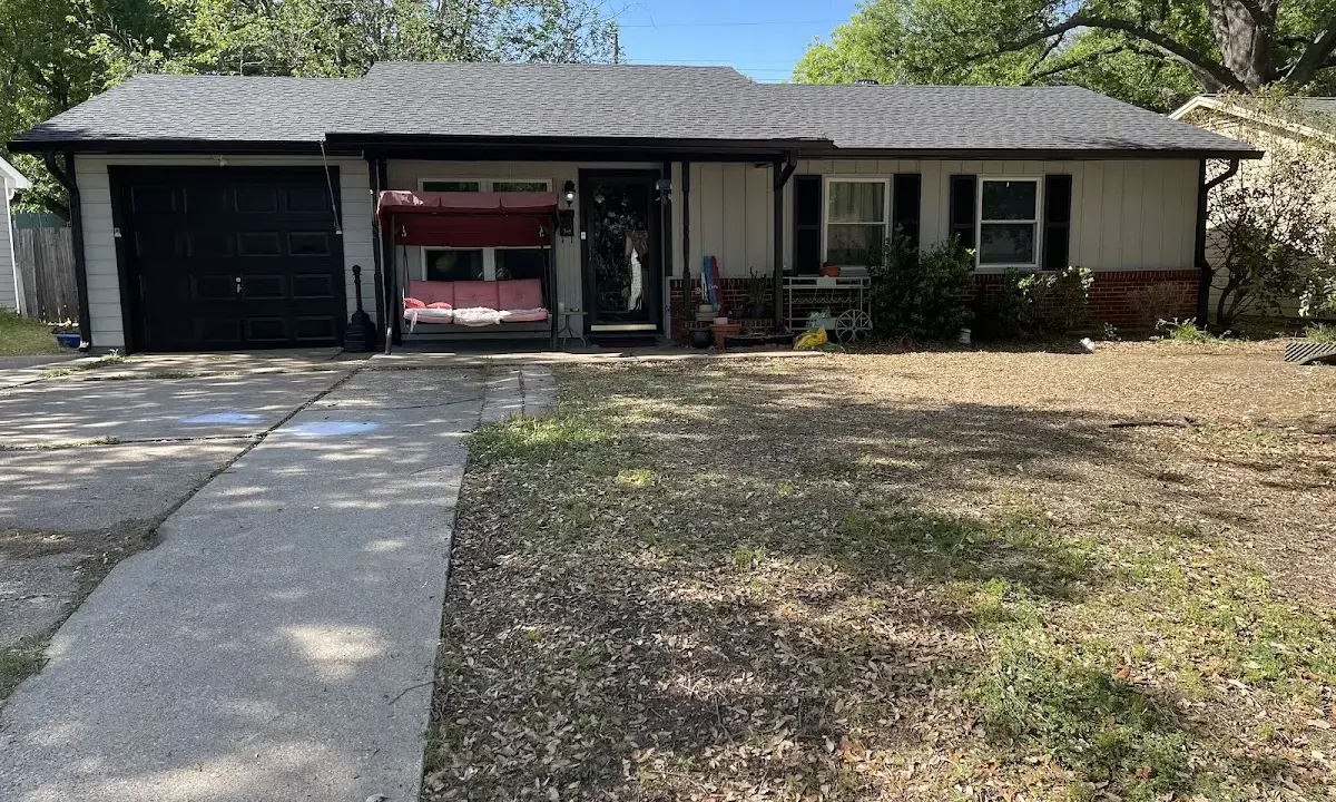 Asphalt Shingle Roof Repair crew at work on a residential roof in Clemmons